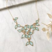 Anthos Leaf Bib Necklace Clear Sky Blue
