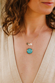 Mother's Necklace sky blue with three child charms in virgo and gemini on model