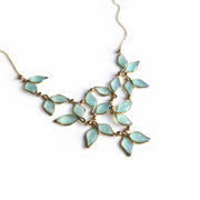 Blue Anthos Leaf Bib Necklace by Carla De La Cruz Jewelry | Blue and Gold Necklace | Blue Statement Necklace | Necklace for Mom